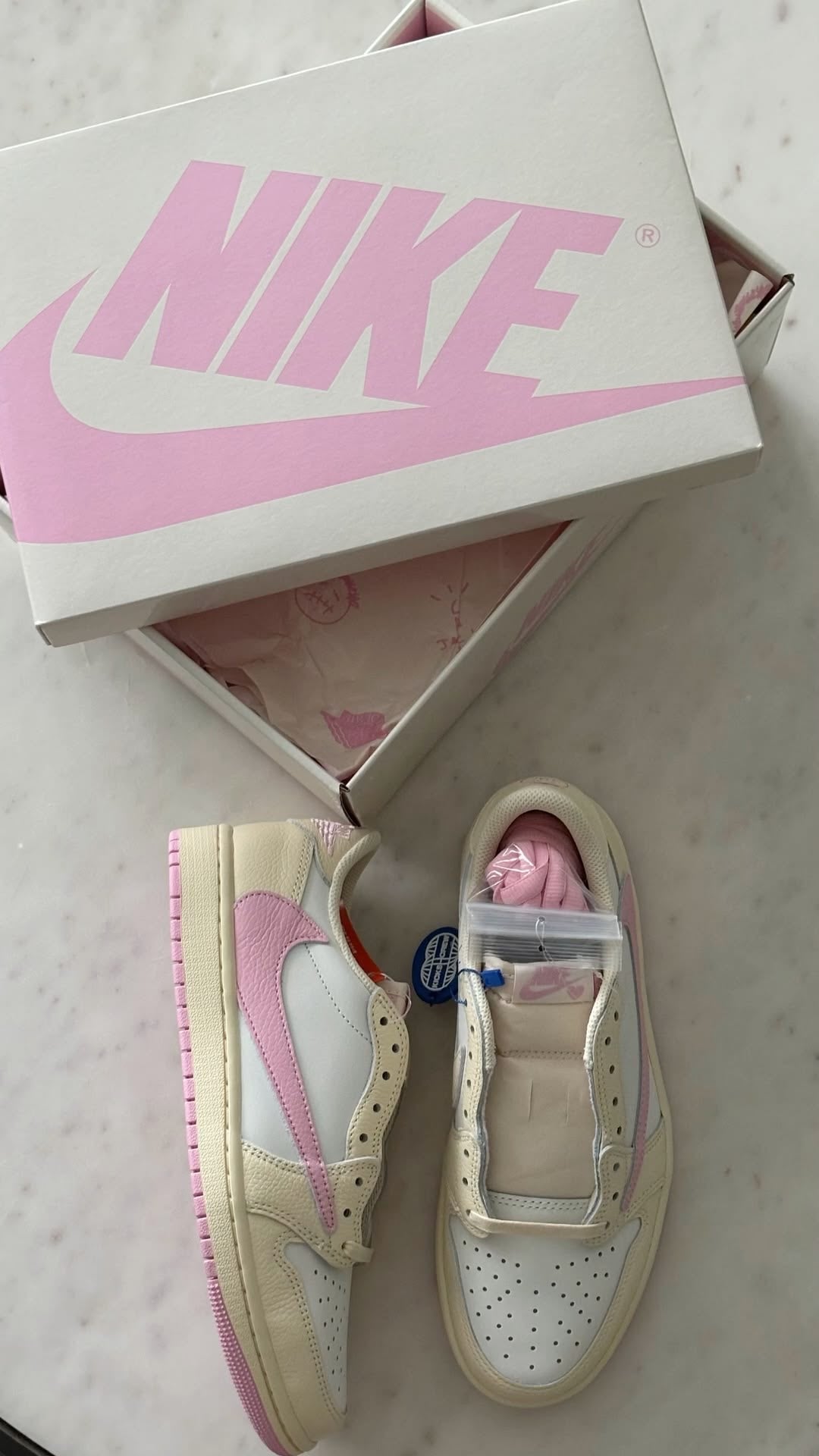Travis Scott x Air Jordan 1 Low Soft Powder Pouring - A Streetwear Revolution - OMYGOODS