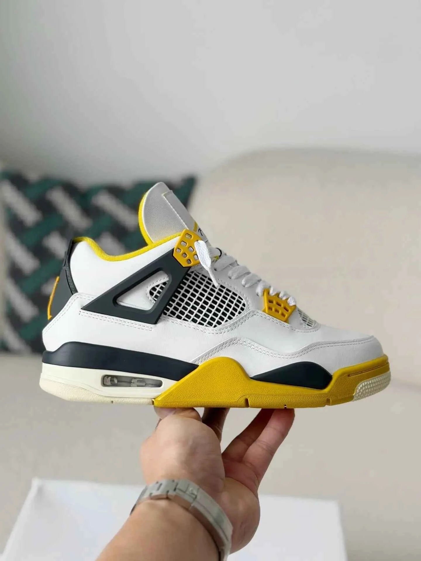 Air Jordan 4 Retro: Vivid Sulfur Sneakers for Bold Style