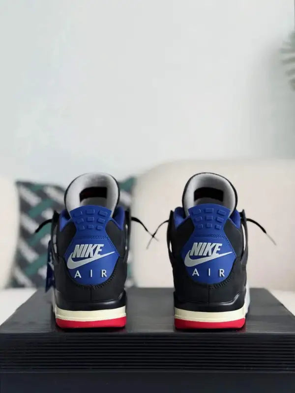 Air Jordan 4 Retro ‘Rare Air’ in Black, Royal Blue, and Red - OMYGOODS