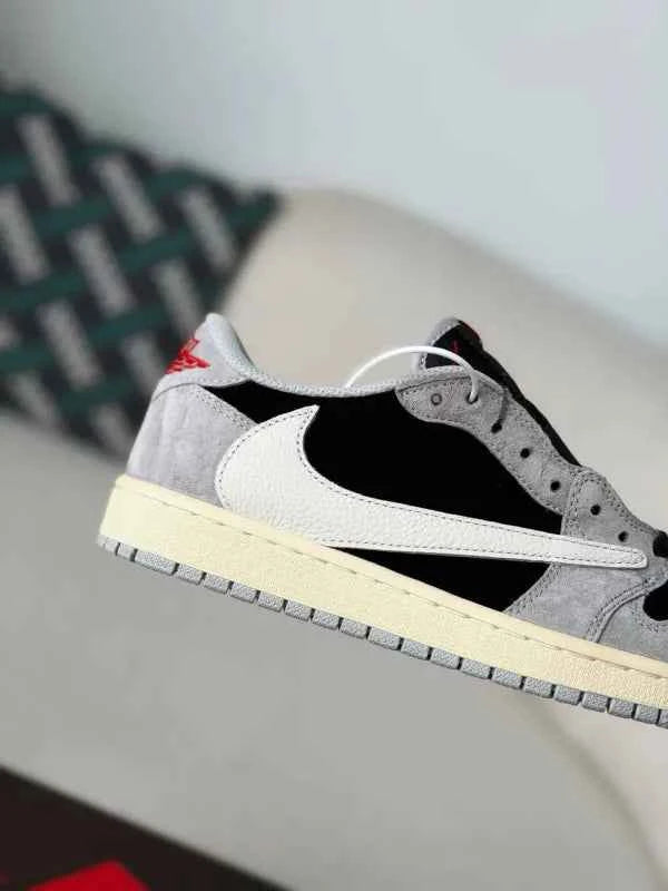 Travis Scott x Air Jordan 1 Low: Black Grey Reverse Swoosh
